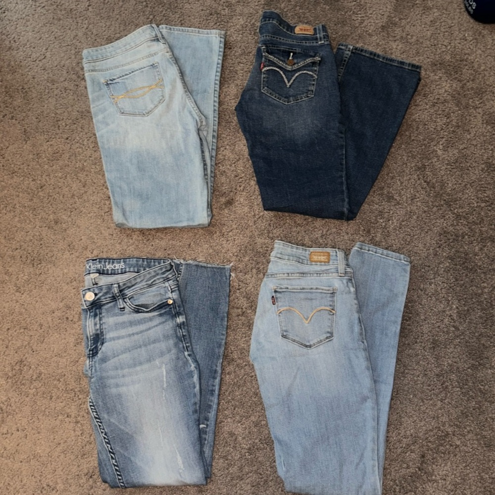 4 pair Levi/ Calvin Klein jeans